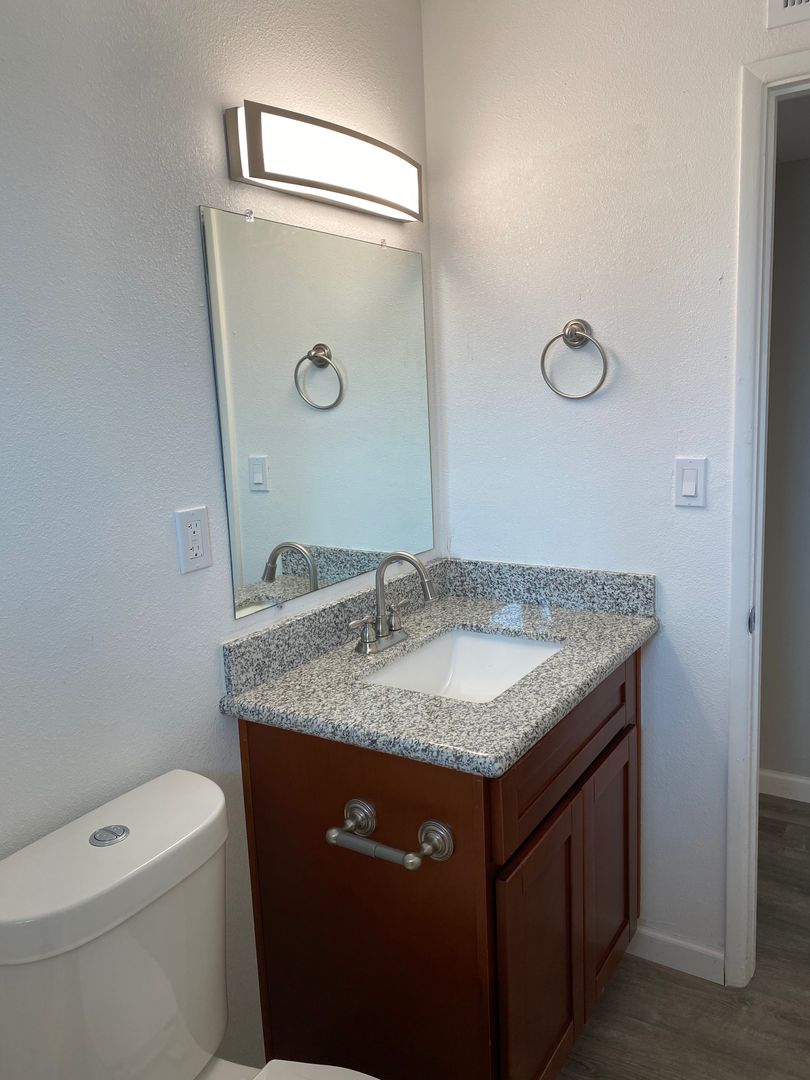 Apartment bathroom — representative home at La Vie.