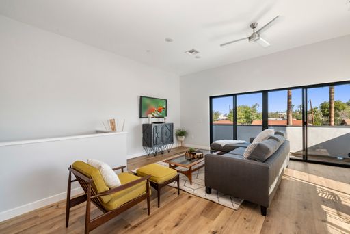 Furnished apartment living area shown — representative home at Halcyon on Cheery Lynn.