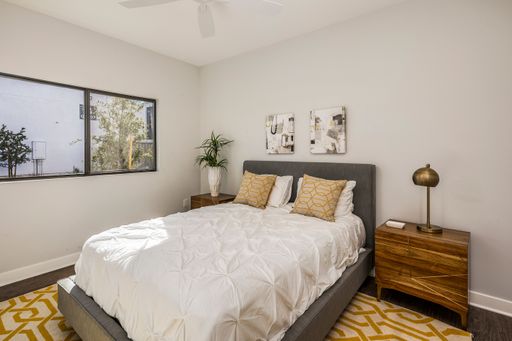 Furnished bedroom shown — representative home at Halcyon on Cheery Lynn.