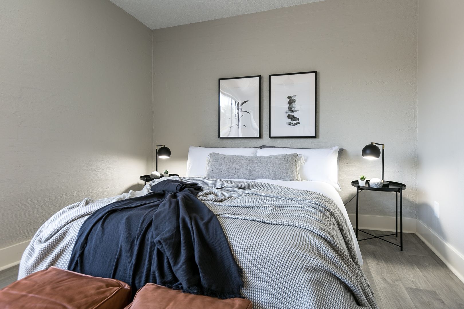 Furnished bedroom shown — representative home at The Marlowe.