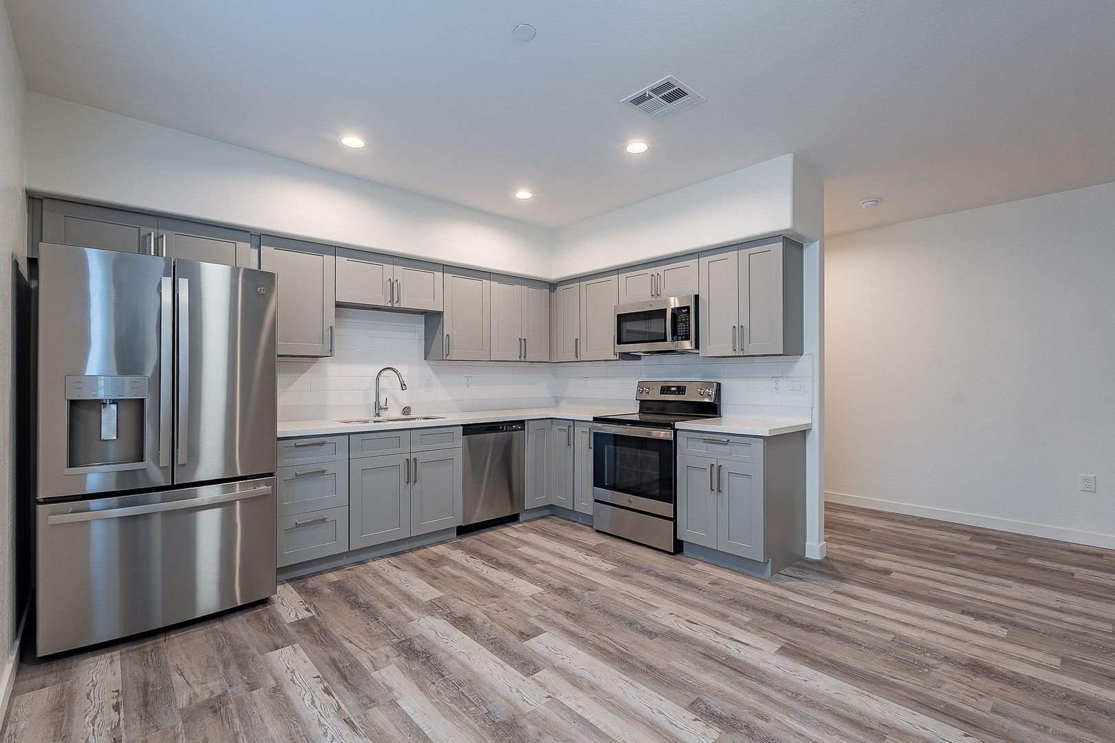 Apartment kitchen — representative home at La Vie.