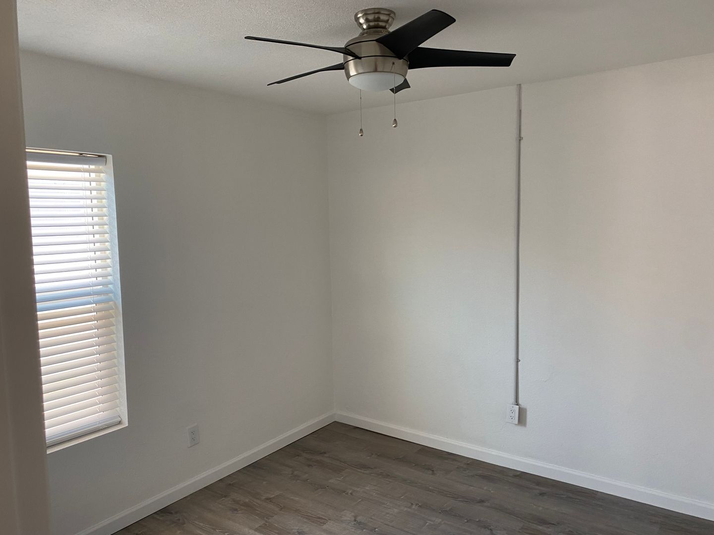 Representative unfurnished bedroom at Turney Cottages.