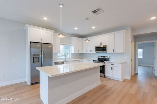 Apartment kitchen — representative home at Halcyon on 18th Street.