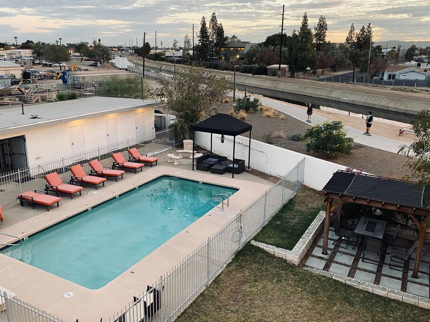 Pool and poolside area at H2O Apartments.