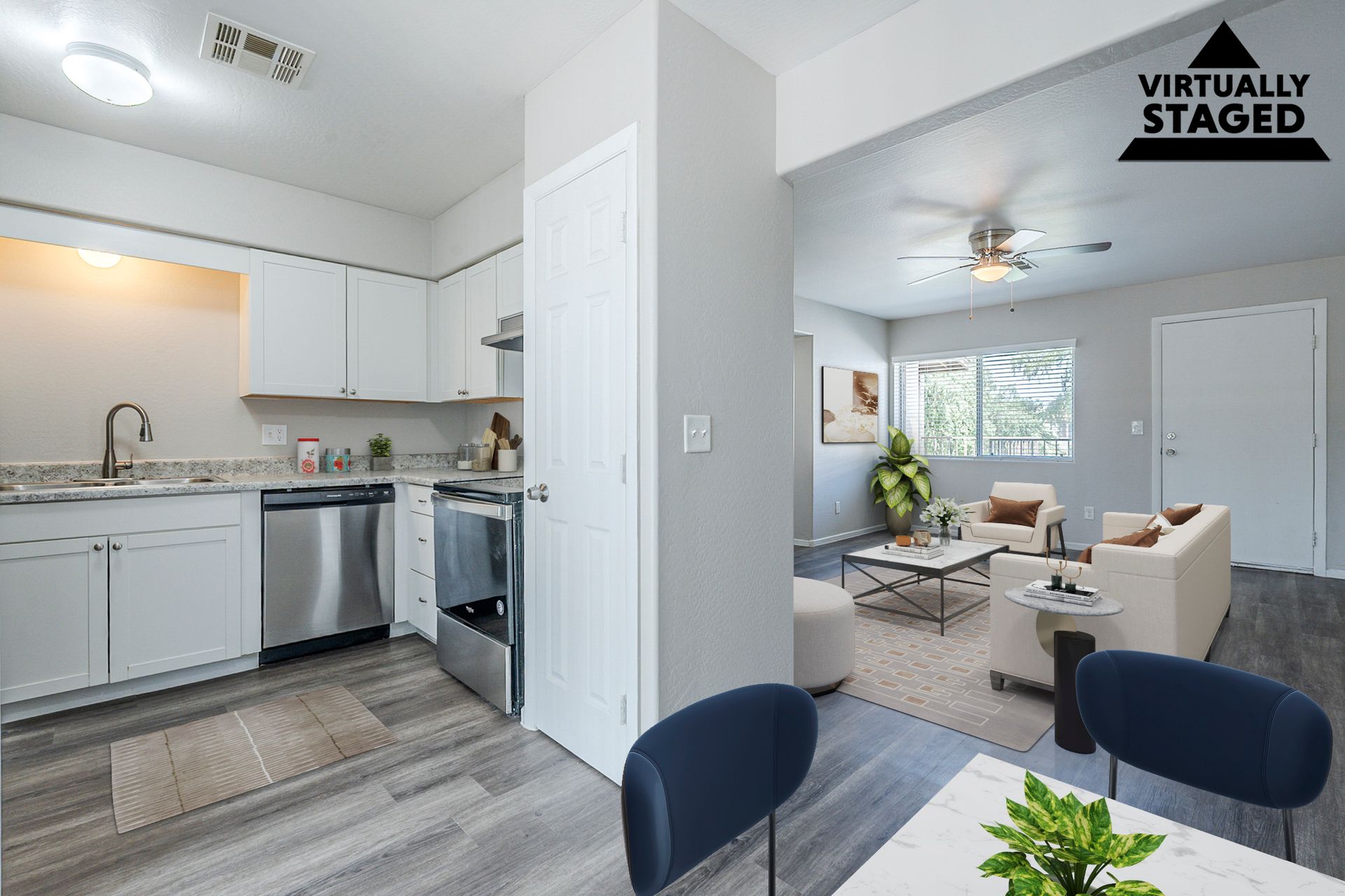 Virtually staged kitchen shown in Apartment 116 at Courtyard Village Apartments.