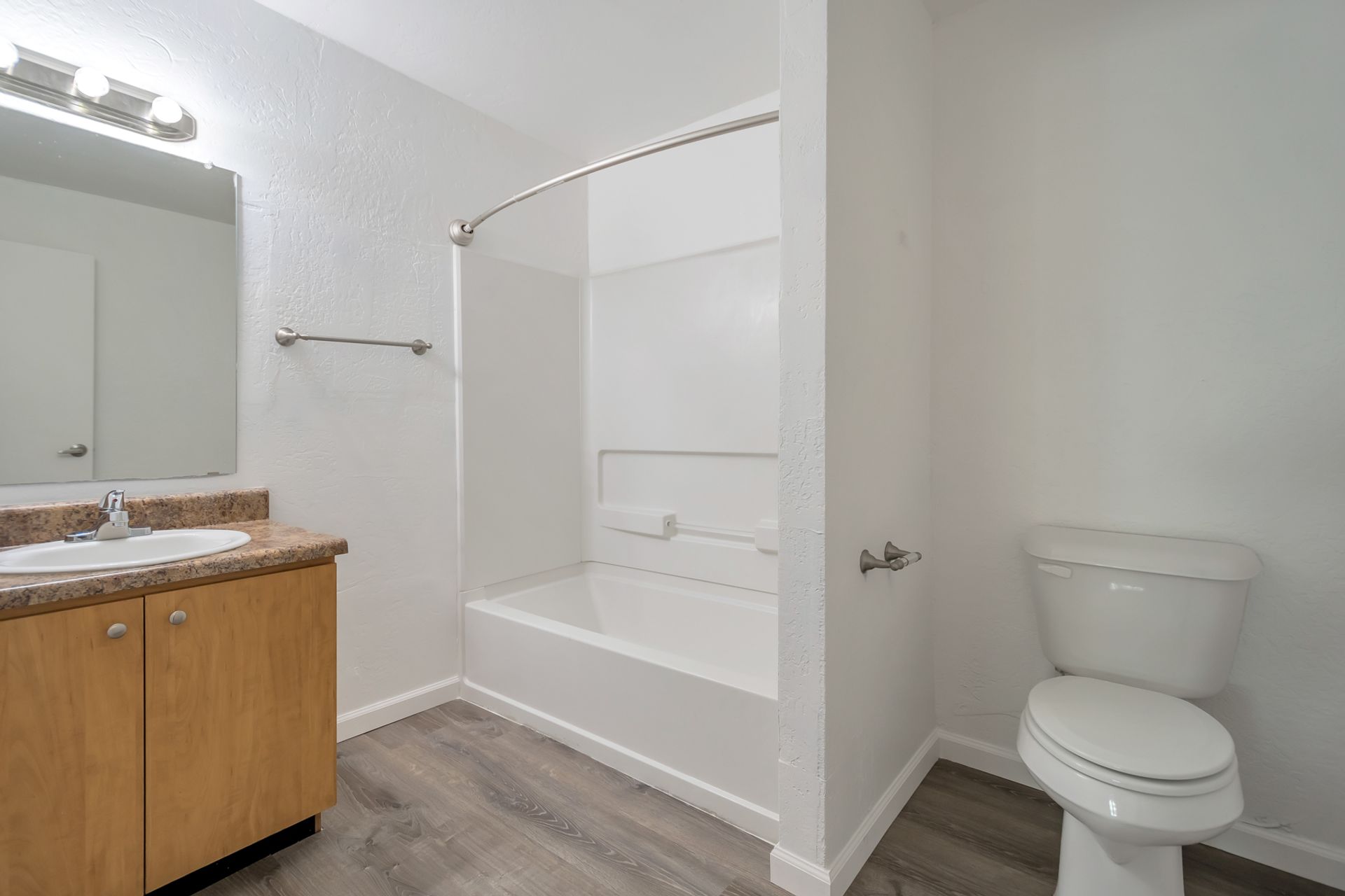 Representative apartment bathroom at Starlight Apartments.