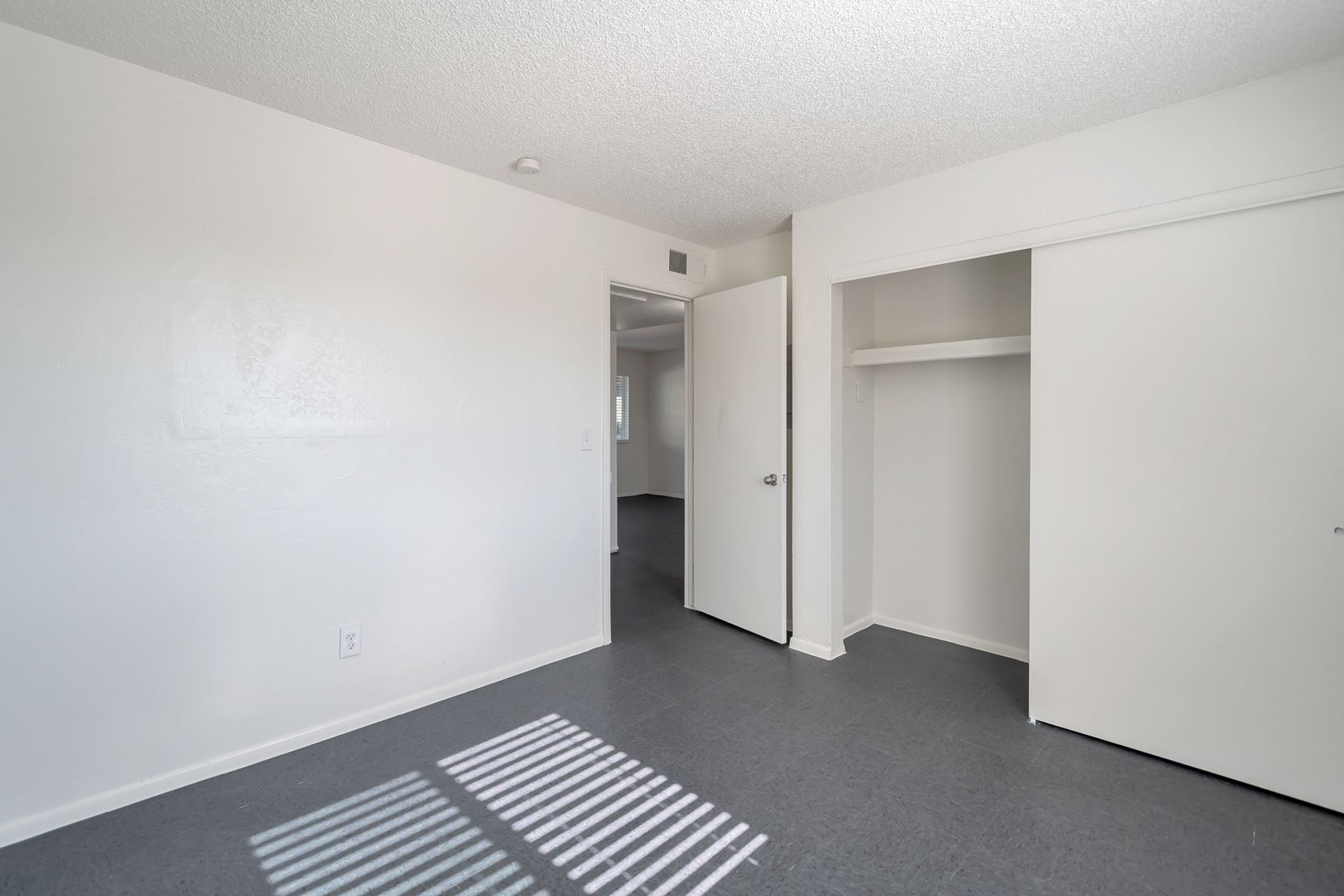 Representative unfurnished bedroom at Starlight Apartments.