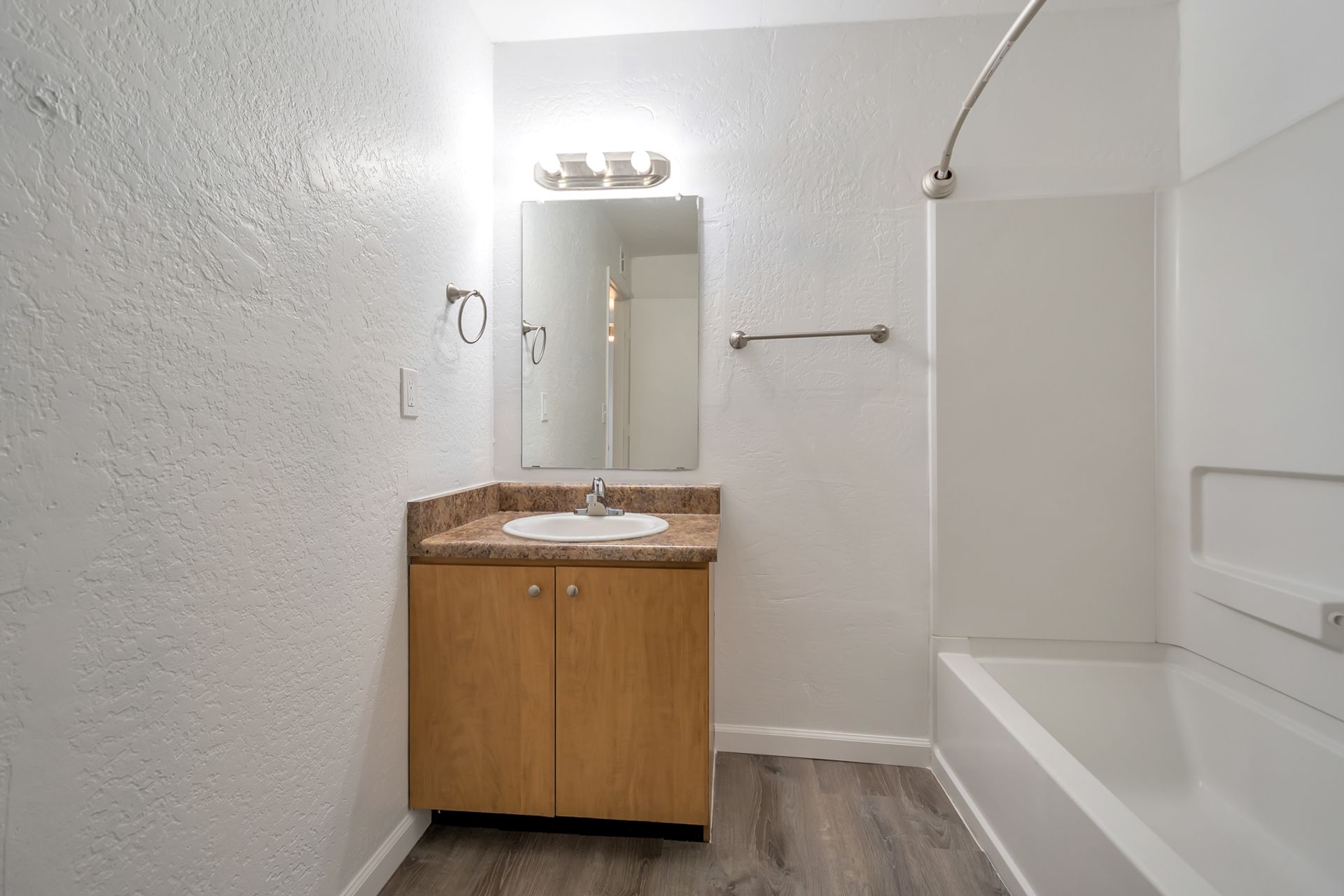 Representative apartment bathroom at Starlight Apartments.