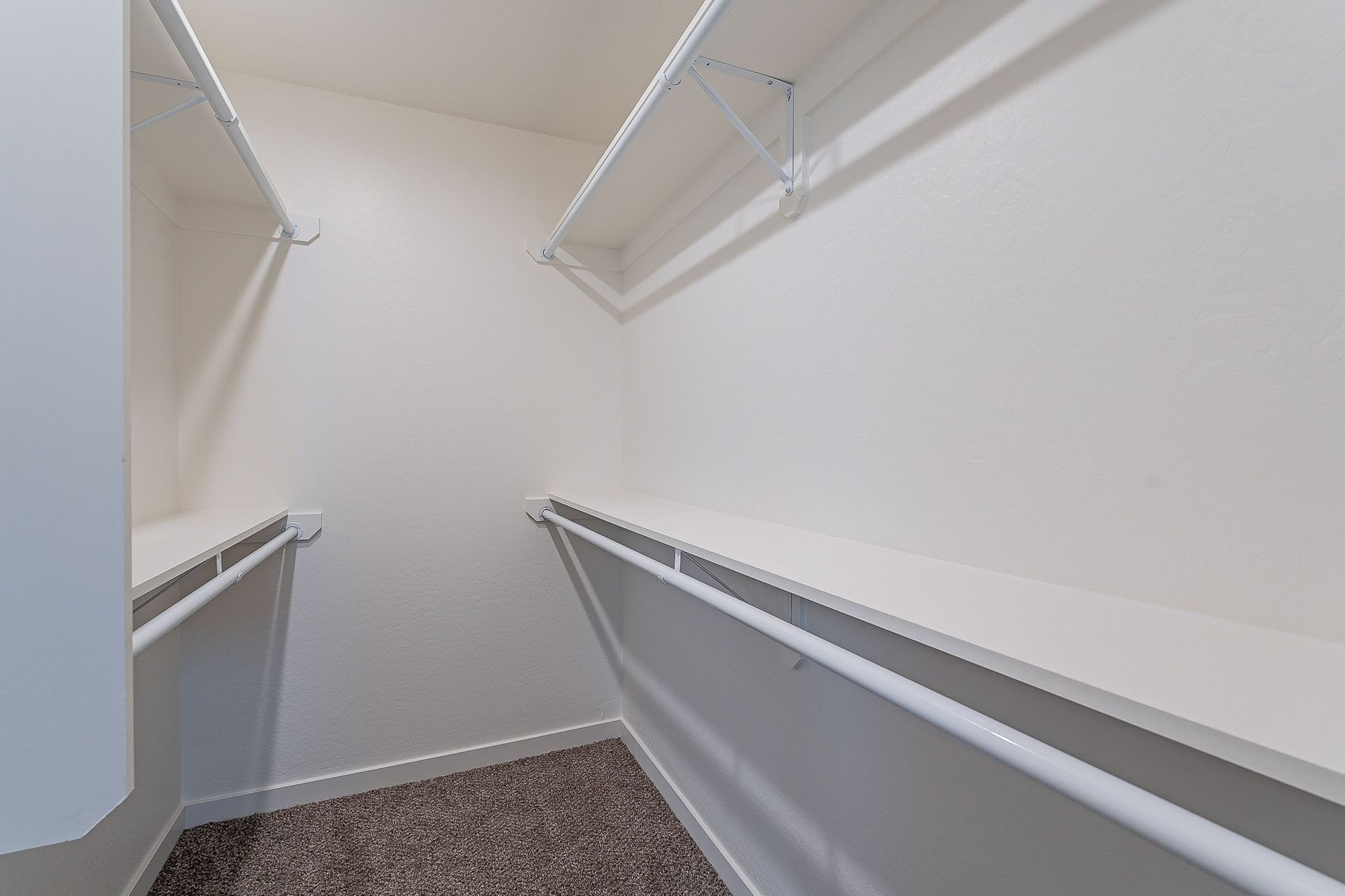 Walk-in closet — representative home at La Vie.