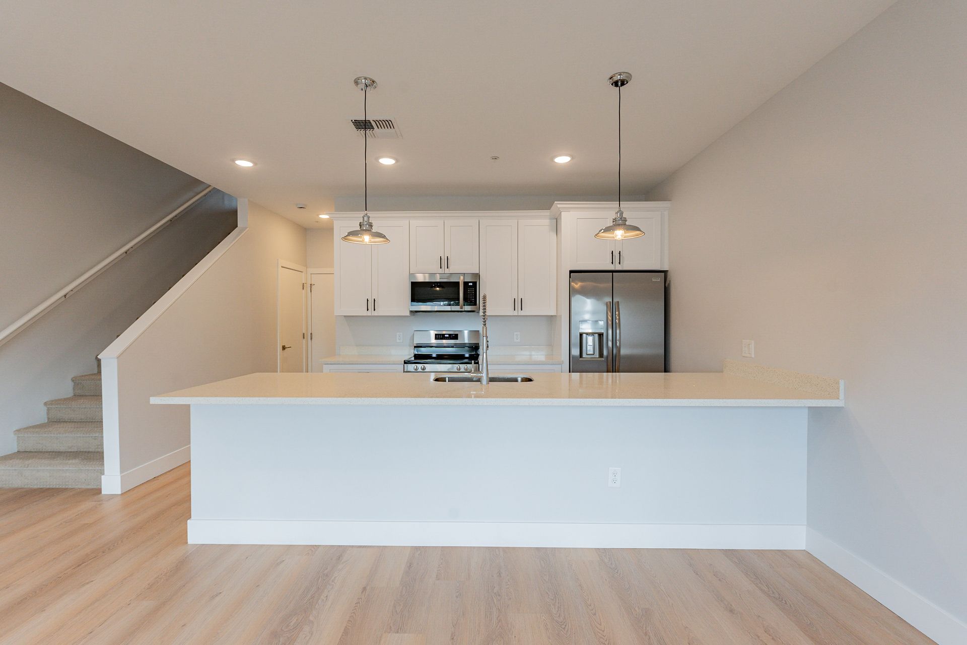 Apartment kitchen — representative home at Halcyon on 18th Street.
