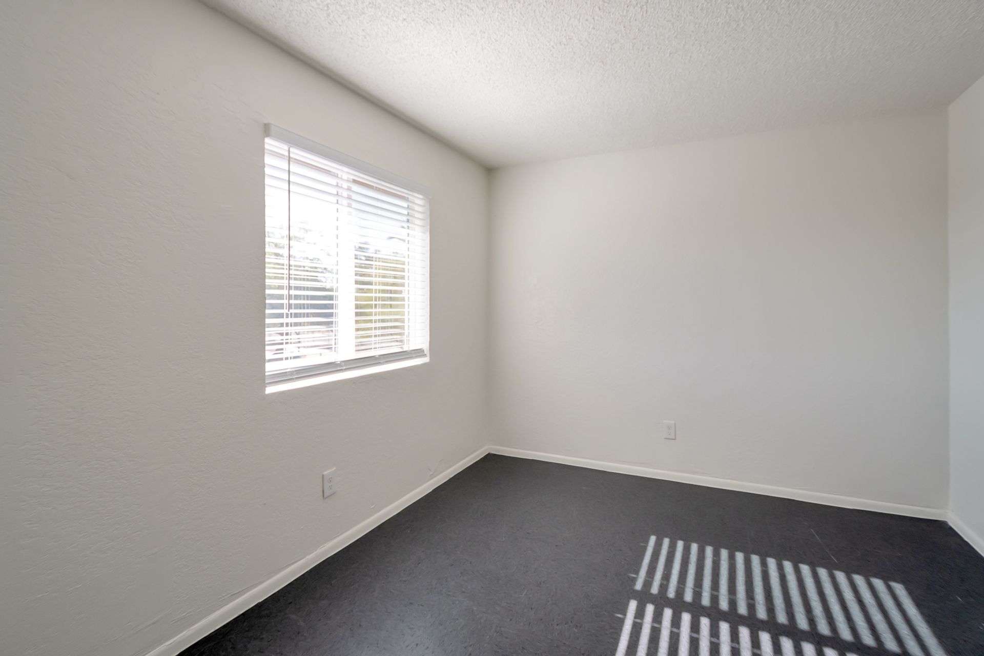 Representative unfurnished bedroom at Starlight Apartments.