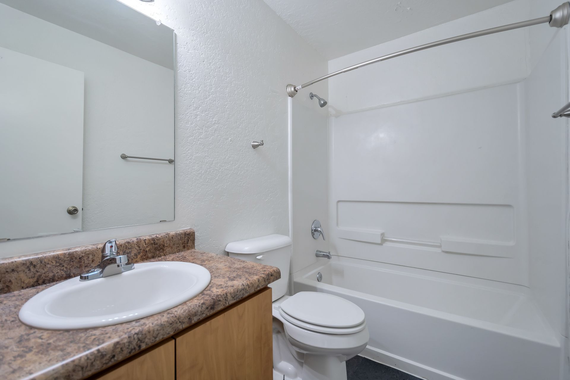 Representative apartment bathroom at Starlight Apartments.