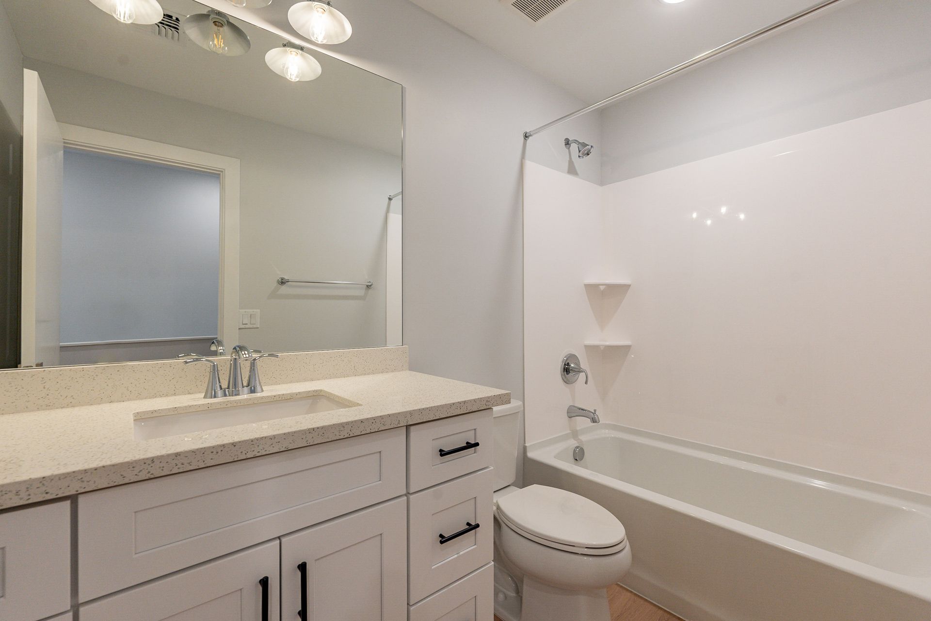 Apartment bathroom — representative home at Halcyon on 18th Street.