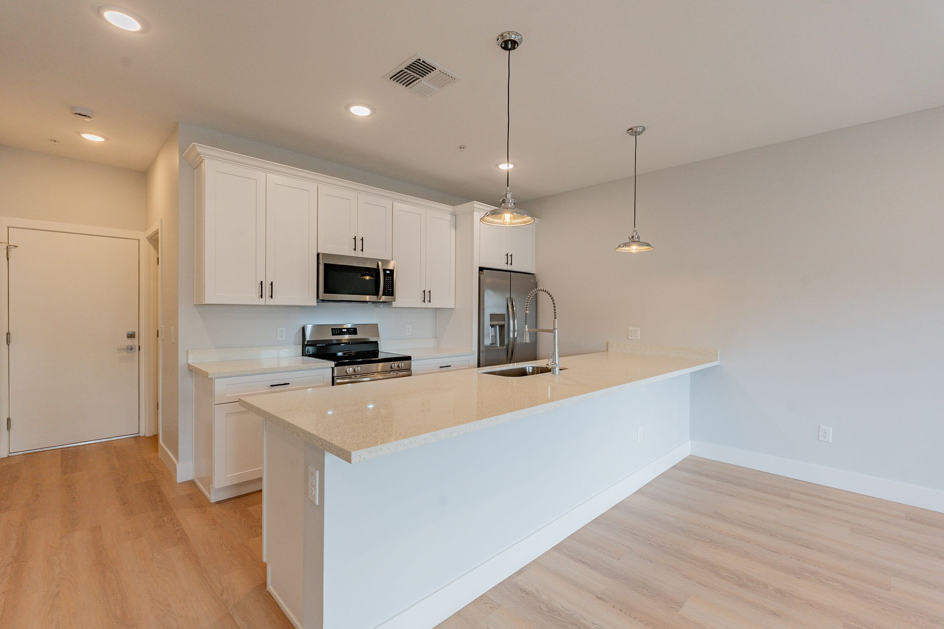 Apartment kitchen — representative home at Halcyon on 18th Street.