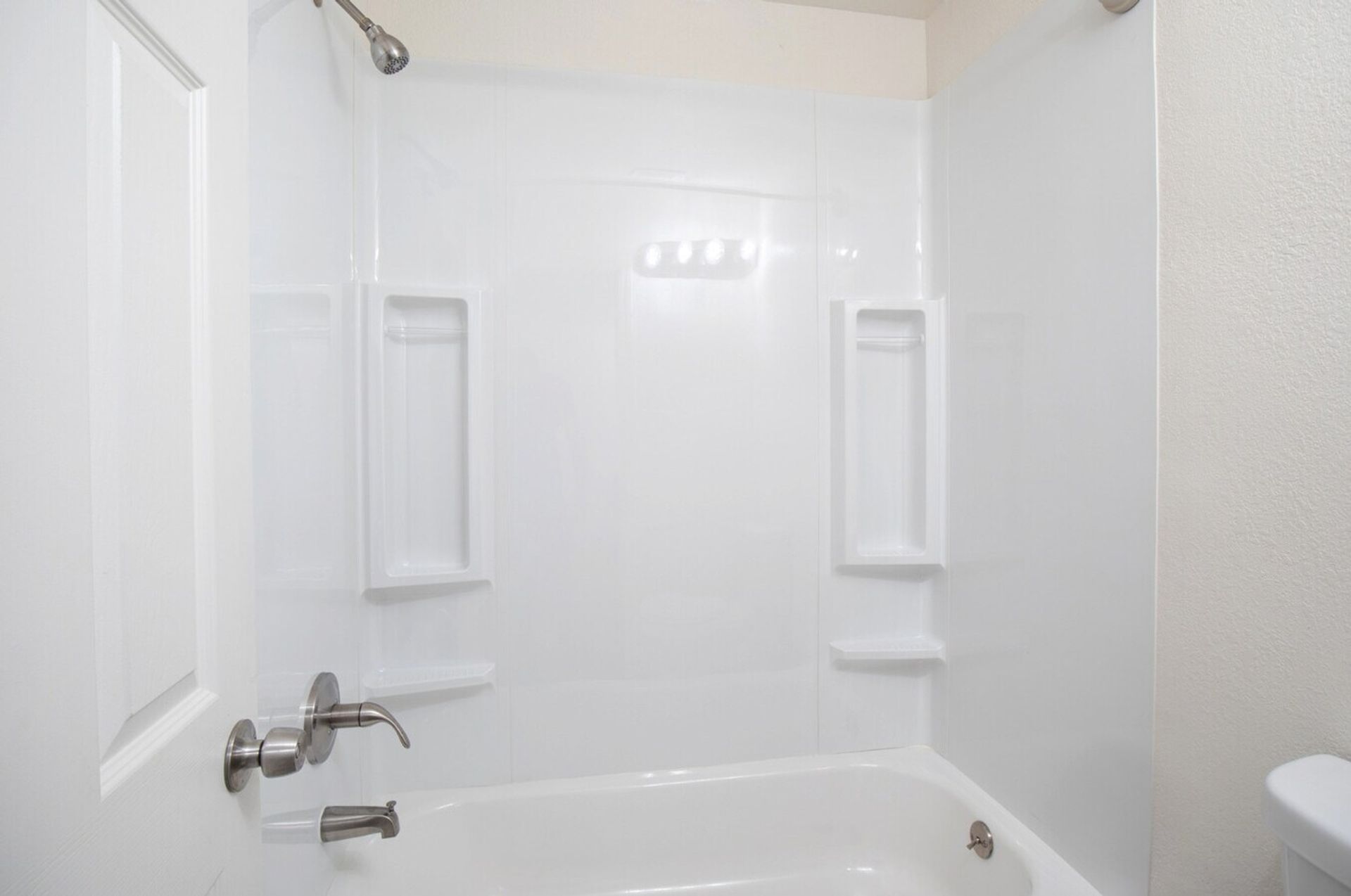 Apartment bathroom — representative home at Lateral 14 Apartments.