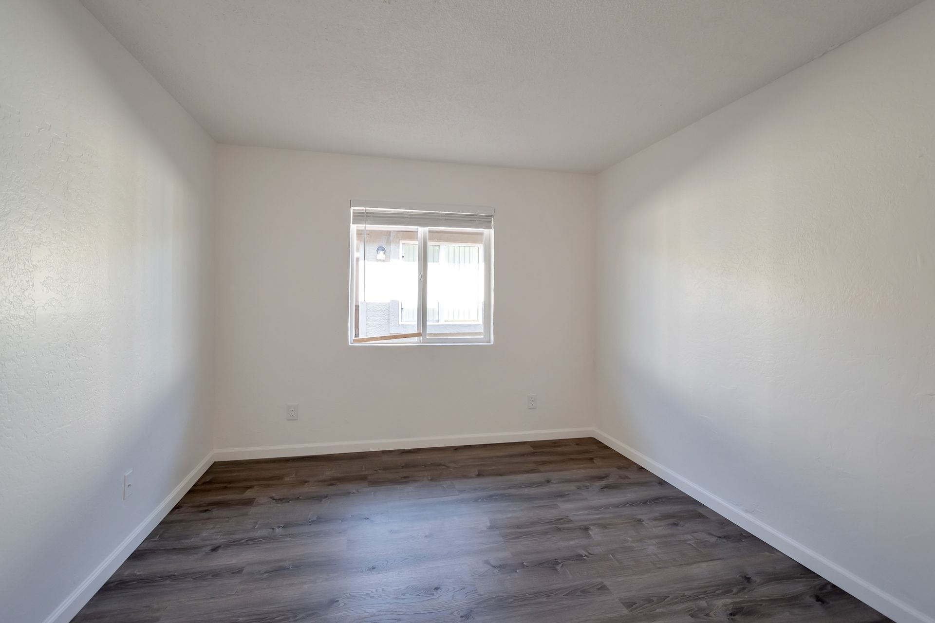 Representative unfurnished bedroom at Starlight Apartments.