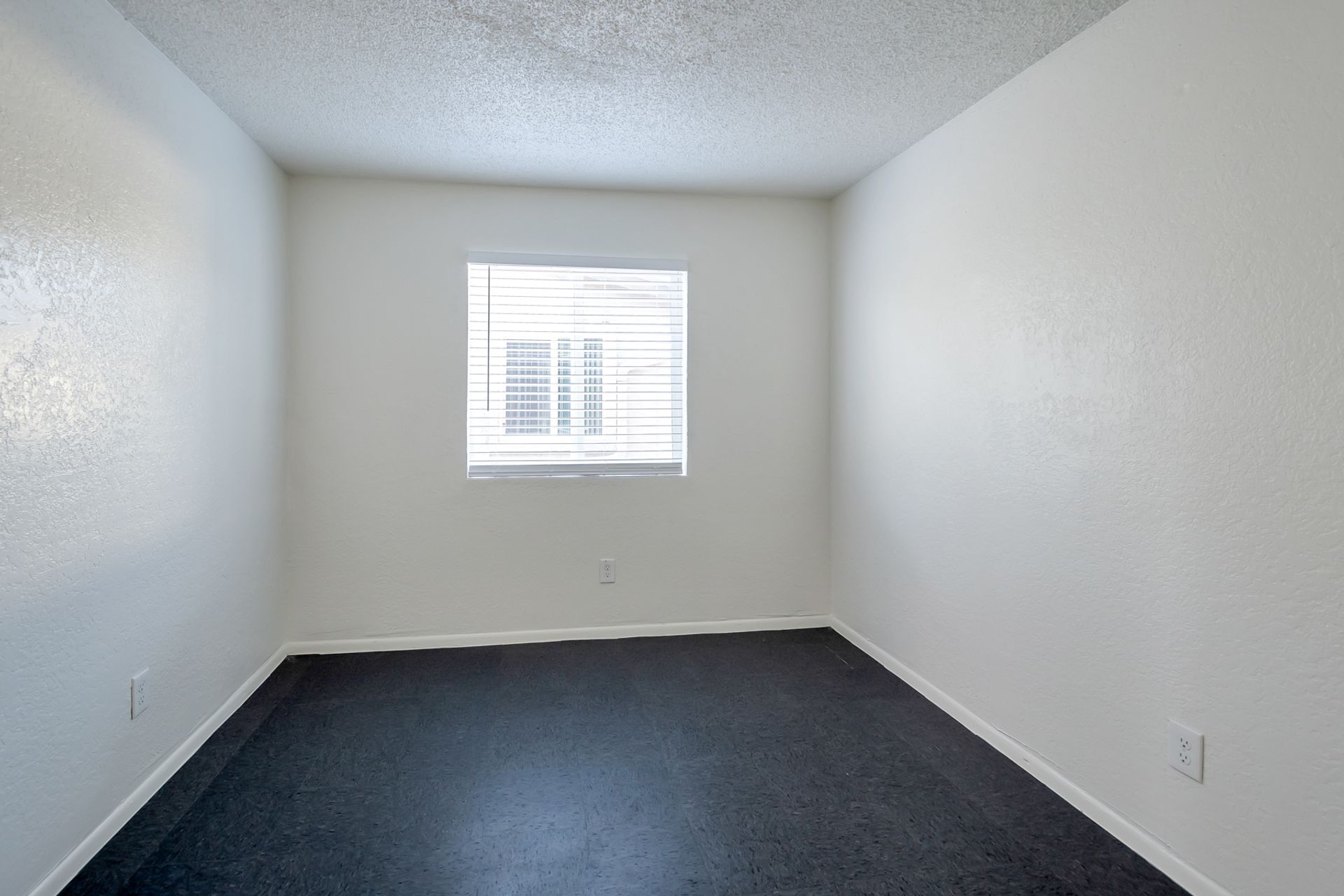 Representative unfurnished bedroom at Starlight Apartments.