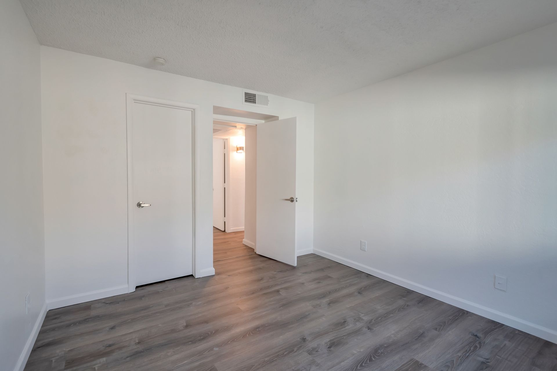 Representative unfurnished bedroom at Starlight Apartments.