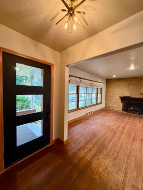 Charming 3-Bedroom Home with Hardwood Floors, Fenced Yard & Garage – photo 1