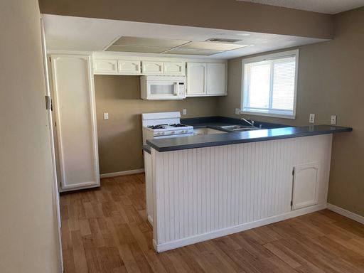 1BD/1BA Second Floor Unit with Parking | Gated Community