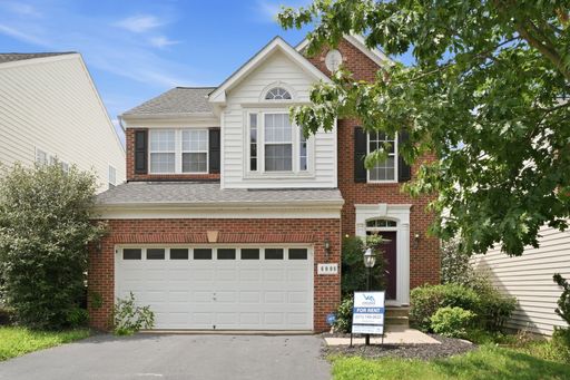 Experience the perfect blend of comfort, style, and functionality in this beautifully designed four bedroom, three and one half bathroom single family residence. – photo 1