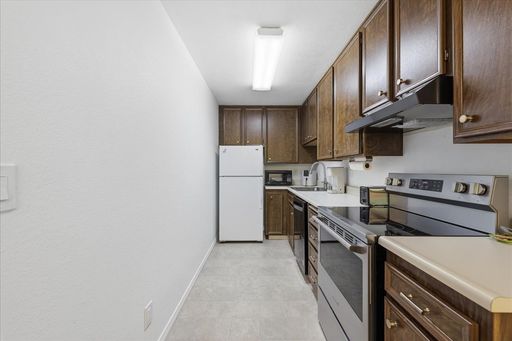 2nd Floor, Corner Unit Condo at Palm Springs Villas II – photo 1
