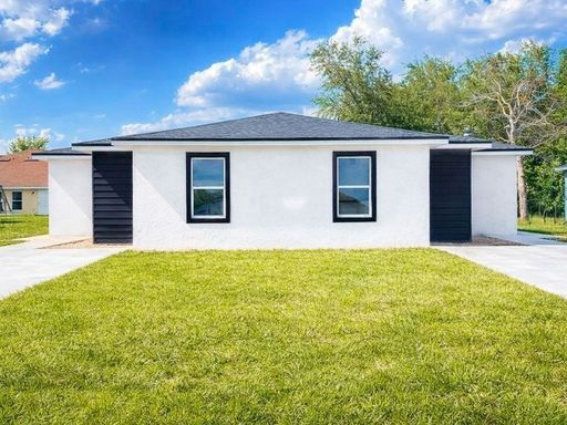 Discover the allure of this duplex unit in Poinciana Villages. – photo 1