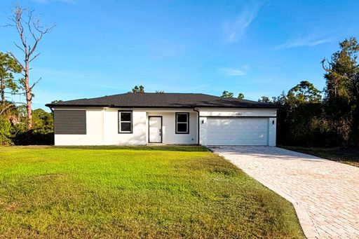 This immaculate, newly built 4-bed, 2-bath home in Port Charlotte is move-in ready or perfect for renting out! – photo 1