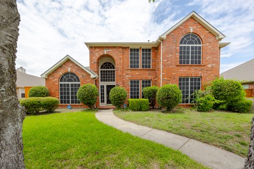 Discover comfort and elegance in this beautifully updated 4-bedroom, 3-bathroom home with 3,476 sq ft of living space, located in a prime Richardson neighborhood. – photo 1