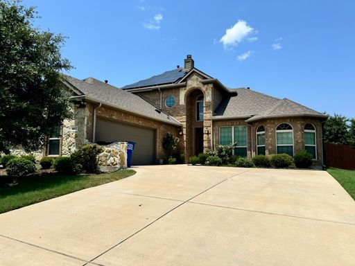 This beautiful home features 4 bedrooms and 3 full bathrooms, with 2 bedrooms conveniently located downstairs and 2 upstairs. – photo 1