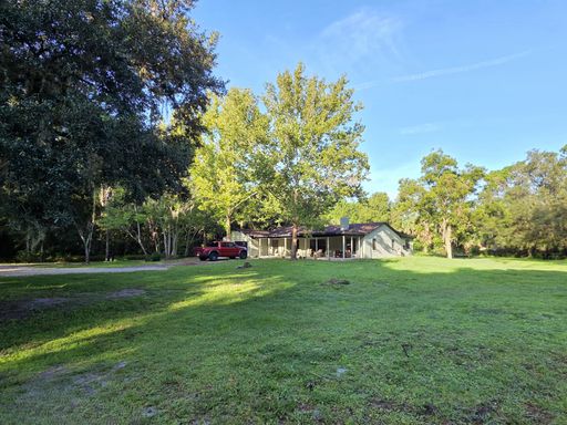 GENEVA - 4BR/2.5BA ON 5 ACRES WITH A PRIVATE POND