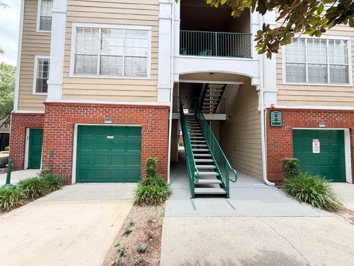 Ground-Floor Condo with Garage, Water & Internet Included in Gated Plantation Park! – photo 1