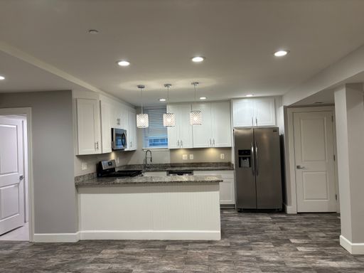 Beautifully Renovated 4BR/2BA with Off-Street Parking Available! – photo 1