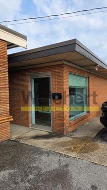 Commercial Building behind Hyde's Pharmacy – photo 1