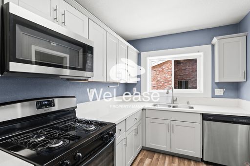 Spacious gated house featuring 4-bedrooms and 2-bathrooms- $500 off First Months Rent – photo 1