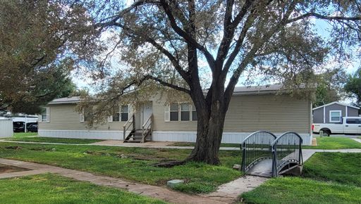 BEAUTIFUL 4 BEDROOM DOUBLEWIDE IN COMMANDER'S PALACE – photo 1