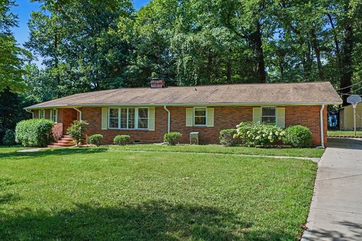 Ranch Home with Hardwood Floors & Covered Parking – photo 1