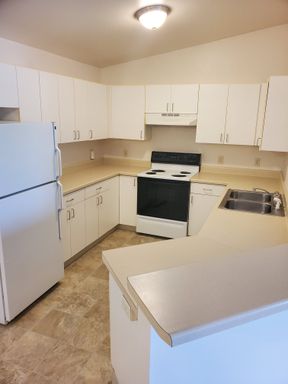 2 Bedroom LOWER: Erika, the On-site Manager for Info & Showings:. – photo 1