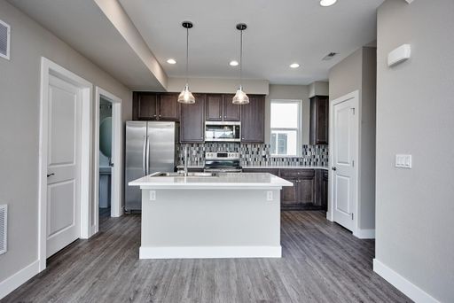 Beautiful Luxury 4 Bedroom Townhome with 2 Car Garage – photo 1