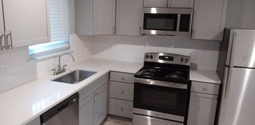 BRAND-NEW UNIT! A Hidden Gem, Completely Remodeled, 2 bedroom 1 bathroom. – photo 1