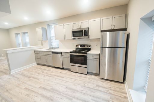 NEW 2 bedroom apt with new stainless appliances. $1295 – photo 1