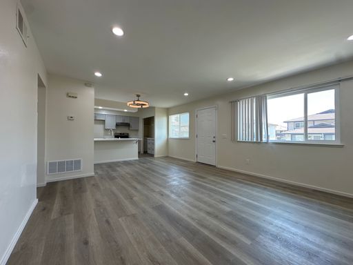 Fully remodeled first-floor corner unit in Highland offering modern upgrades and convenient living.